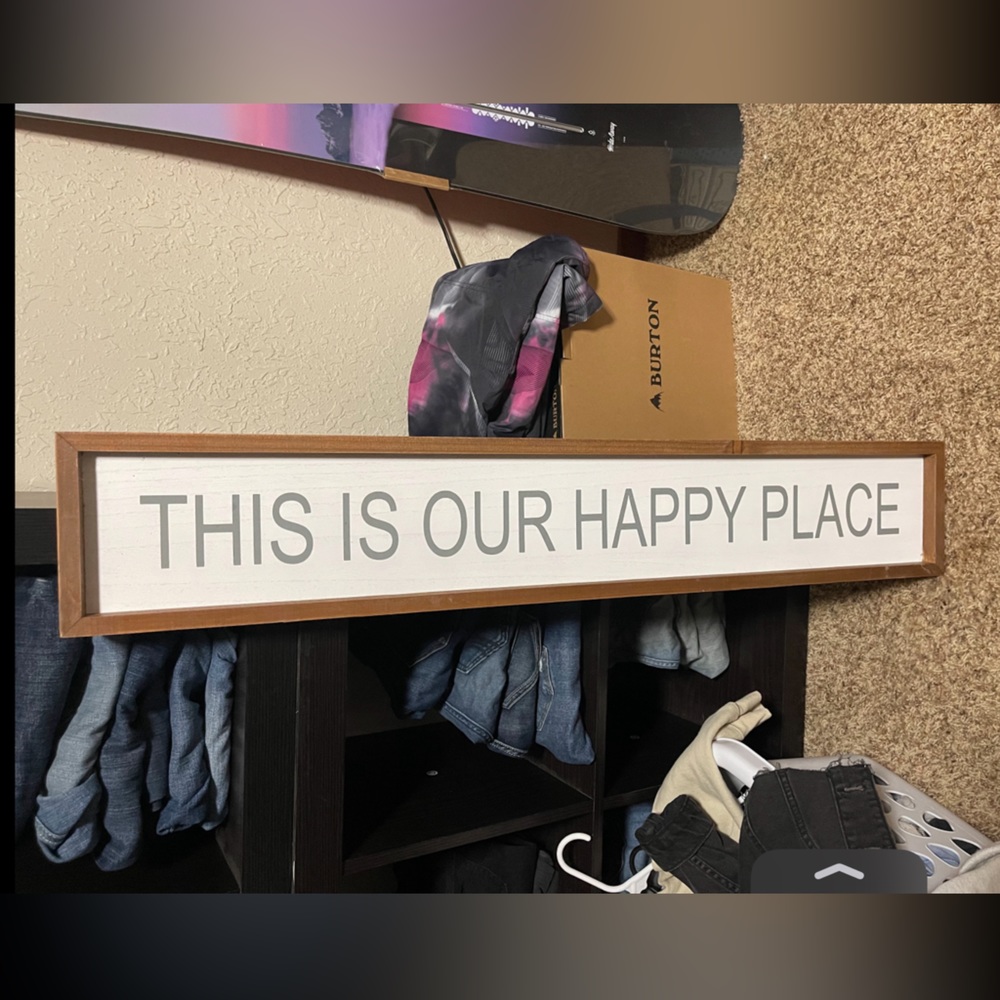 “this is our happy place” sign